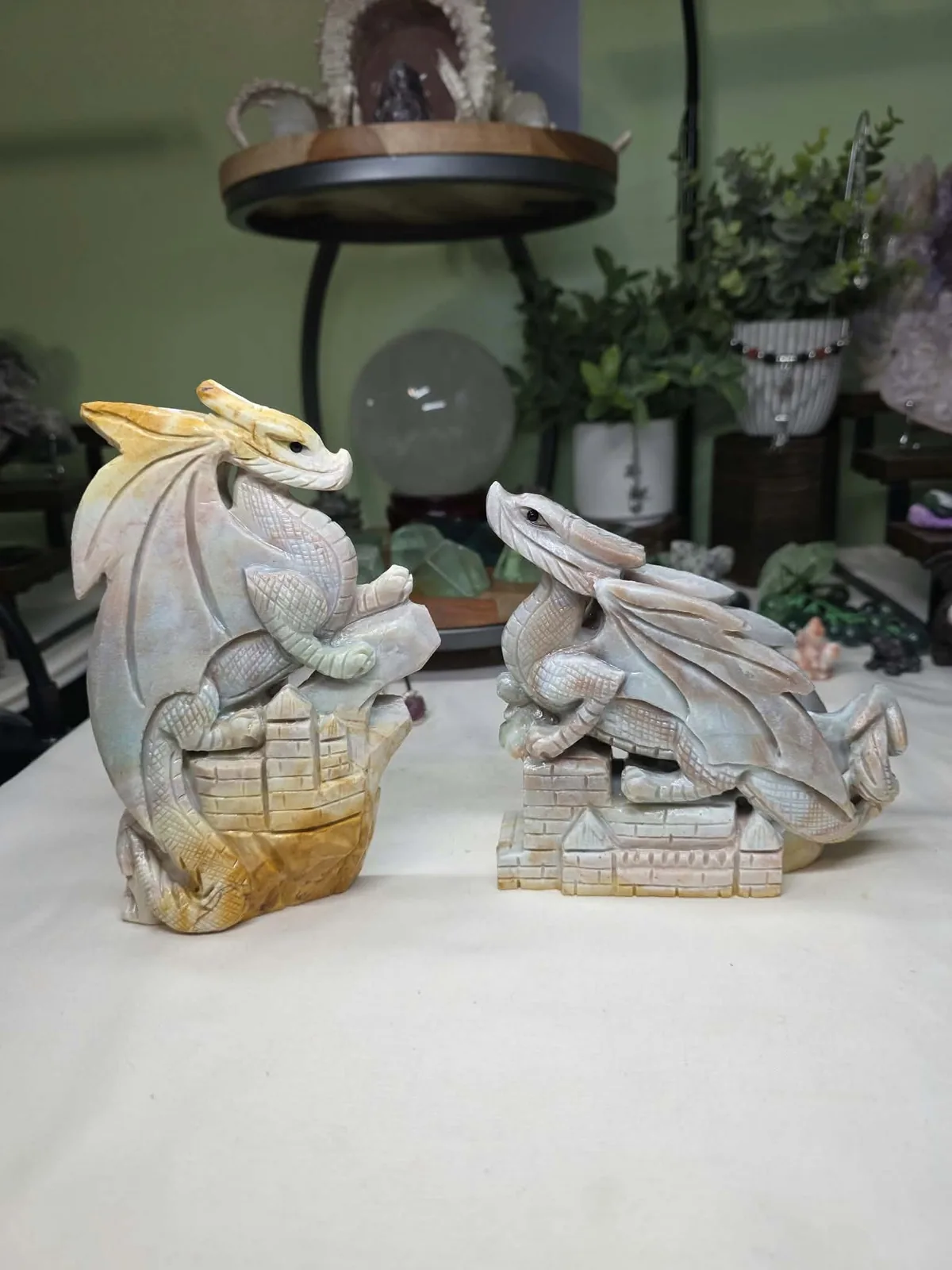 Ann’s pair of amazonite dragon carvings displayed together as photographed.